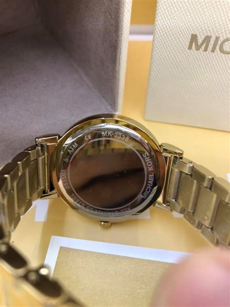 how to check authenticity of michael kors watch|check Michael Kors Watch serial number.